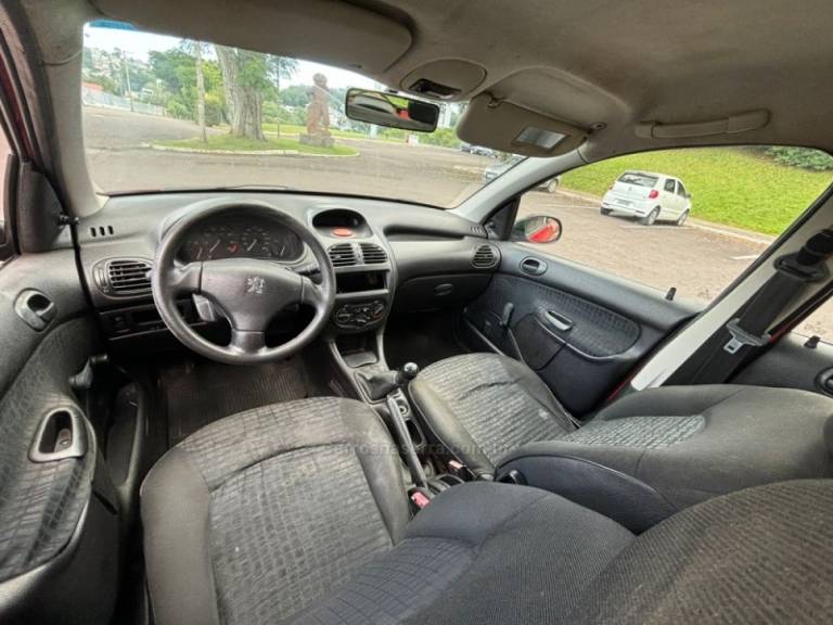 PEUGEOT - 206 - 2003/2003 - Vermelha - R$ 6.950,00